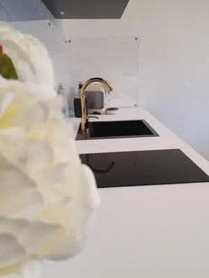 Küche/Küchenzeile in der Unterkunft Melody Apartment mit E-Ladesäule und mobiler Klimaanlage