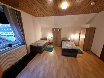 Ein Bett oder Betten in einem Zimmer der Unterkunft Haus Ruhrpott