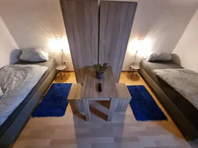 Ein Bett oder Betten in einem Zimmer der Unterkunft Haus Ruhrpott