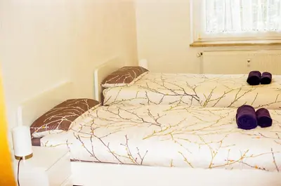Ein Bett oder Betten in einem Zimmer der Unterkunft Vivo Hospital Maxi