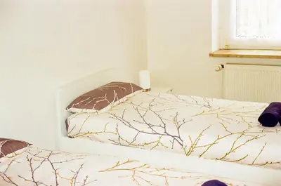 Ein Bett oder Betten in einem Zimmer der Unterkunft Vivo Hospital Maxi