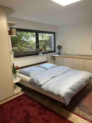 Ein Bett oder Betten in einem Zimmer der Unterkunft Schöne ruhige Wohnung (42qm) in Messenähe!