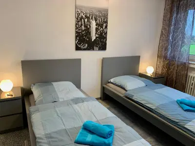 Ein Bett oder Betten in einem Zimmer der Unterkunft Ruhrpott-Liebe