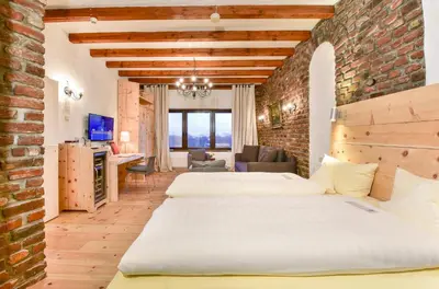 Ein Bett oder Betten in einem Zimmer der Unterkunft Hotel Land Gut Höhne