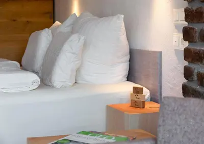 Ein Bett oder Betten in einem Zimmer der Unterkunft Hotel Land Gut Höhne