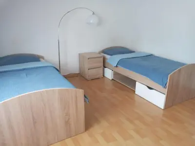 Ein Bett oder Betten in einem Zimmer der Unterkunft Monteurzimmer/Ferienwohnung Bottrop
