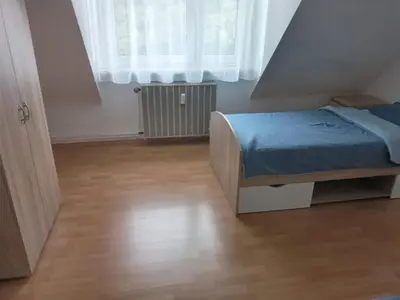 Ein Bett oder Betten in einem Zimmer der Unterkunft Monteurzimmer/Ferienwohnung Bottrop