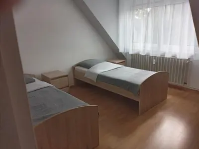 Ein Bett oder Betten in einem Zimmer der Unterkunft Monteurzimmer/Ferienwohnung Bottrop
