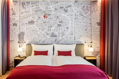 Ein Bett oder Betten in einem Zimmer der Unterkunft IntercityHotel Dortmund