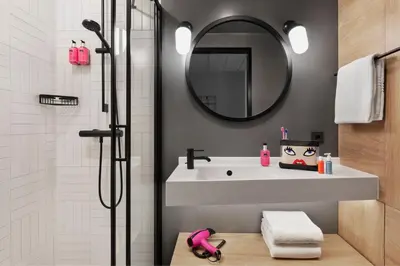 Ein Badezimmer in der Unterkunft Moxy Duesseldorf City