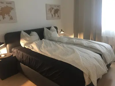 Ein Bett oder Betten in einem Zimmer der Unterkunft Modern living in a perfect location