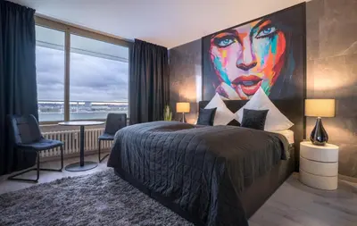 Ein Bett oder Betten in einem Zimmer der Unterkunft RüSuite III - Gemütliches Apartment in Essen