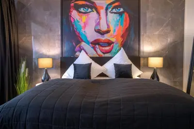 Ein Bett oder Betten in einem Zimmer der Unterkunft RüSuite III - Gemütliches Apartment in Essen