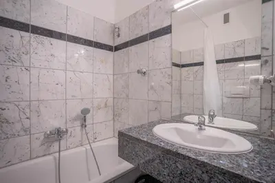 Ein Badezimmer in der Unterkunft RüSuite III - Gemütliches Apartment in Essen