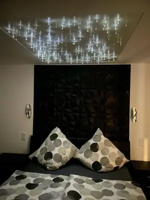 Ein Bett oder Betten in einem Zimmer der Unterkunft My Home Deluxe Ferienwohnung Sauna