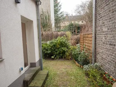 Ein Garten an der Unterkunft Moderne Apartments City Stadtnah -JUNIK Apartments