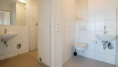 Ein Badezimmer in der Unterkunft T&K Apartments Comfortable 3 Room Apartments with Balcony