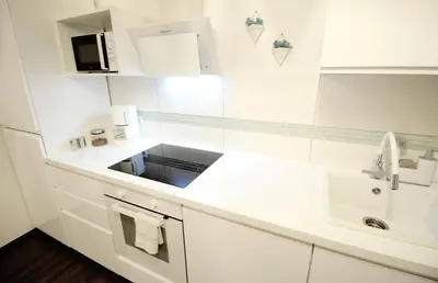 Küche/Küchenzeile in der Unterkunft Space Loft Wohndesign mit 2 Schlafzimmern l 450m bis Uni
