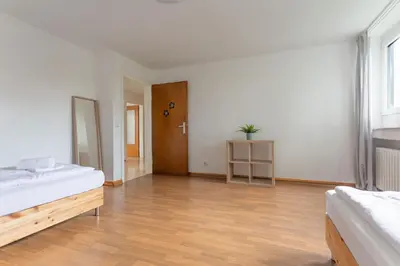 Ein Bett oder Betten in einem Zimmer der Unterkunft T&K Apartments - 3 Room Apartment