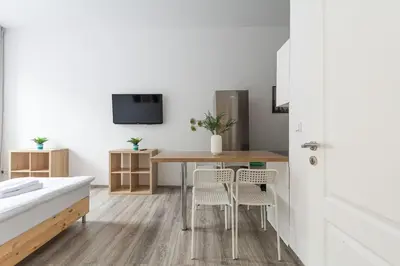 Ein Bett oder Betten in einem Zimmer der Unterkunft T&K Apartments - 2 Room Apartment - Ground Floor