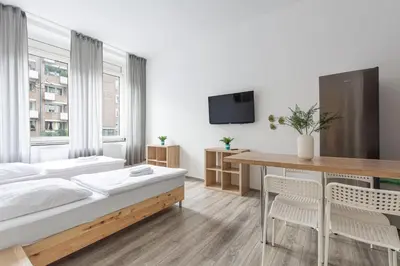 Ein Bett oder Betten in einem Zimmer der Unterkunft T&K Apartments - 2 Room Apartment - Ground Floor