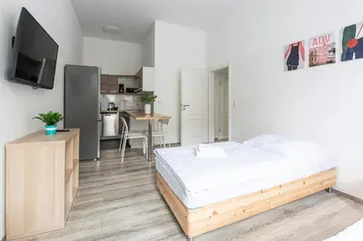 Ein Bett oder Betten in einem Zimmer der Unterkunft T&K Apartments - 2 Room Apartment - Ground Floor