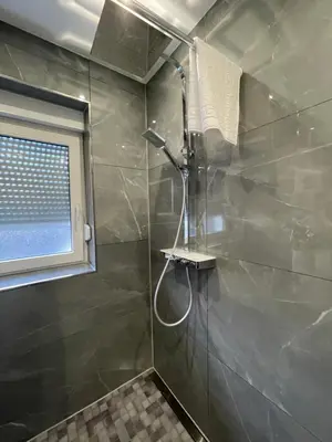Ein Badezimmer in der Unterkunft - Top Ausstattung - Kostenlos Netflix/Wifi/Parken
