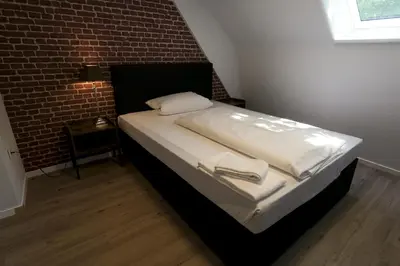 Ein Bett oder Betten in einem Zimmer der Unterkunft P8 Ferienwohnung
