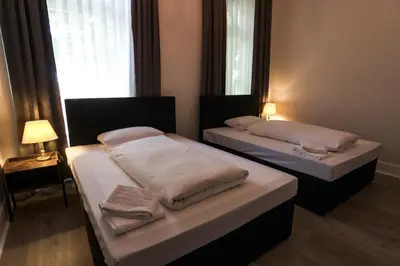 Ein Bett oder Betten in einem Zimmer der Unterkunft P8 Ferienwohnung