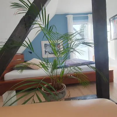 Ein Bett oder Betten in einem Zimmer der Unterkunft ZwischenRaum