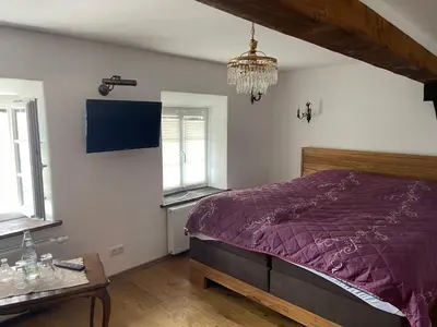 Ein Bett oder Betten in einem Zimmer der Unterkunft Pension Ruhrfrosch