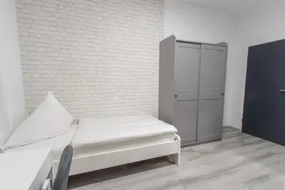 Ein Bett oder Betten in einem Zimmer der Unterkunft Hotel Billard Center Weywiesen