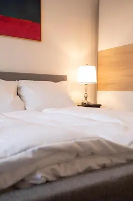 Ein Bett oder Betten in einem Zimmer der Unterkunft JayBnB - Gemütliches Apartment direkt am Hafen von Dortmund