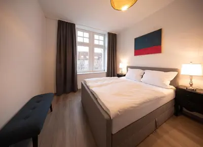 Ein Bett oder Betten in einem Zimmer der Unterkunft JayBnB - Gemütliches Apartment direkt am Hafen von Dortmund