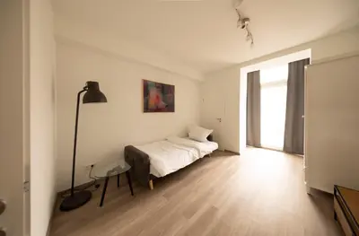 Ein Bett oder Betten in einem Zimmer der Unterkunft JayBnB - Gemütliches Apartment direkt am Hafen von Dortmund