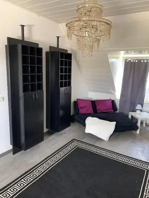 Ein Sitzbereich in der Unterkunft Home24