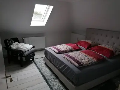 Ein Bett oder Betten in einem Zimmer der Unterkunft Haus Lupo am Kanal