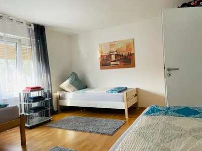 Ein Bett oder Betten in einem Zimmer der Unterkunft Bei Daniel am Dortmunder Flughafen