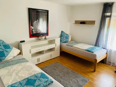 Ein Bett oder Betten in einem Zimmer der Unterkunft Bei Daniel am Dortmunder Flughafen