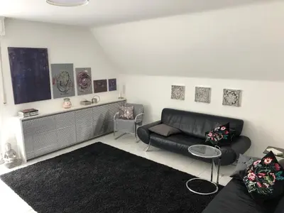 Ein Sitzbereich in der Unterkunft Bel Art Etage mit großem Parkplatz