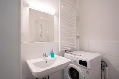 Ein Badezimmer in der Unterkunft RüSuite XL I 2-Zimmer Apartment I Balkon I Netflix