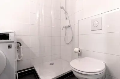 Ein Badezimmer in der Unterkunft RüSuite XL I 2-Zimmer Apartment I Balkon I Netflix