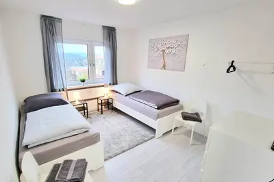 Ein Bett oder Betten in einem Zimmer der Unterkunft -CS24- 5 rooms apartment with balcony - IL01