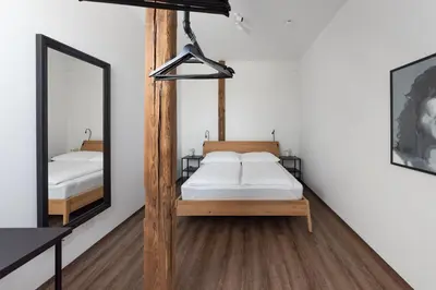 Ein Bett oder Betten in einem Zimmer der Unterkunft Lunas Appartements in der alten Schule Essen