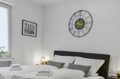 Ein Bett oder Betten in einem Zimmer der Unterkunft Apartment mit Terrasse, privater Eingang und Parkplatz