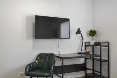 TV/Unterhaltungsangebot in der Unterkunft Apartment mit Terrasse, privater Eingang und Parkplatz
