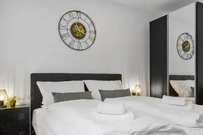 Ein Bett oder Betten in einem Zimmer der Unterkunft Apartment mit Terrasse, privater Eingang und Parkplatz