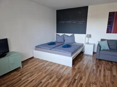 Ein Sitzbereich in der Unterkunft Well located flat with balcony