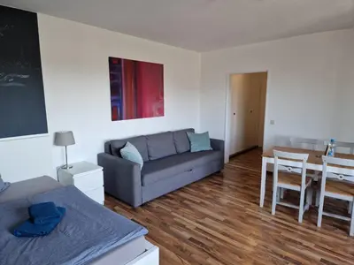 Ein Sitzbereich in der Unterkunft Well located flat with balcony