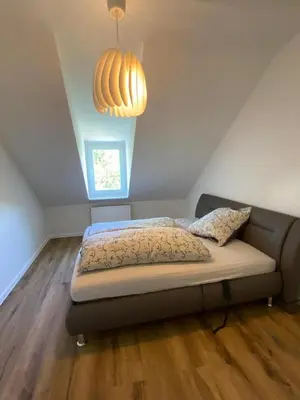 Ein Bett oder Betten in einem Zimmer der Unterkunft Wolke 7